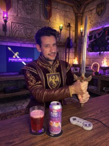 Cerveja Brazilian Sour vermelha intensa ao lado de Fire Emblem no Super Nintendo.