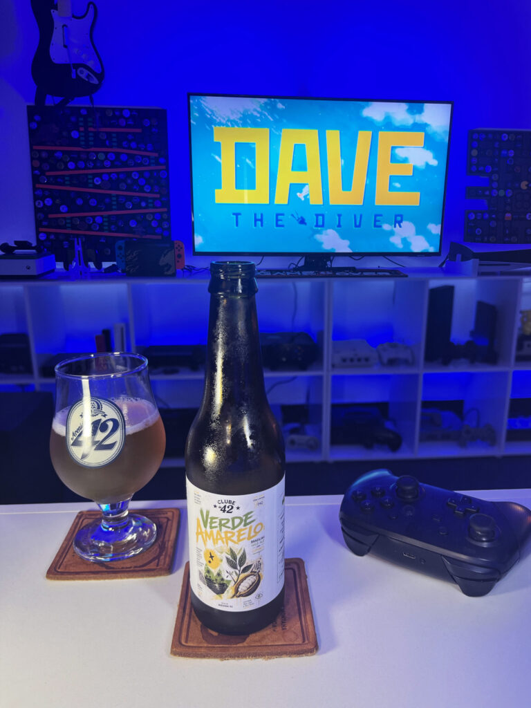 Wild Ale Verde Amarelo do Clube da 42 ao lado de Dave the Diver no Nintendo Switch.