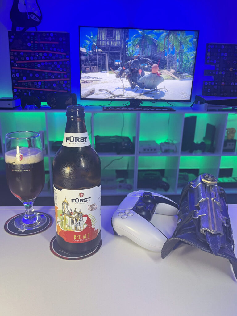 Cerveja Red Ale ao lado de Assassin's Creed Black Flag Resynced no PS5.